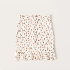 Abercrombie & Fitch Smocked Mini Skirt in White Peach